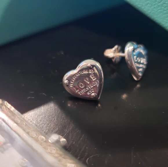 Bulova woman's watch & Tiffany &Co earings
